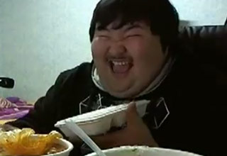 image of Japanese guy laughing at food